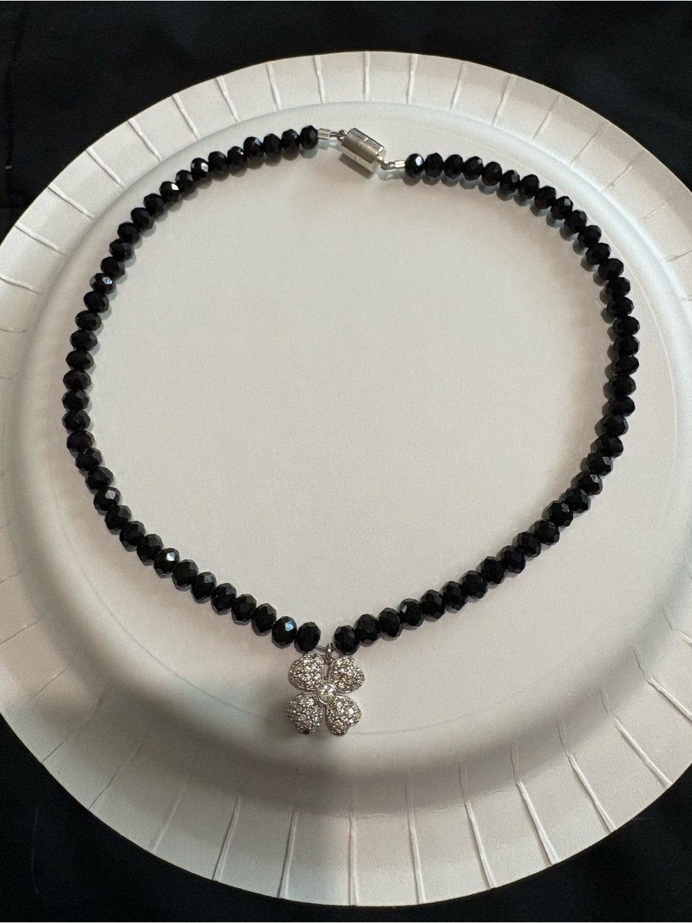 Black Beaded Necklace with Sparkling Clover Pendant
